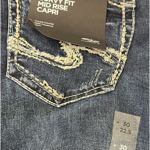 Women’s silver jeans size 30 brand new with tags. Darker denim